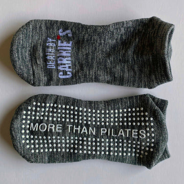 Men’s charcoal grey grip socks with Death By Carrie’s logo